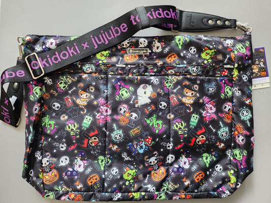 Multicolored cartoon character bag with 'tokidoki' branding on a black background