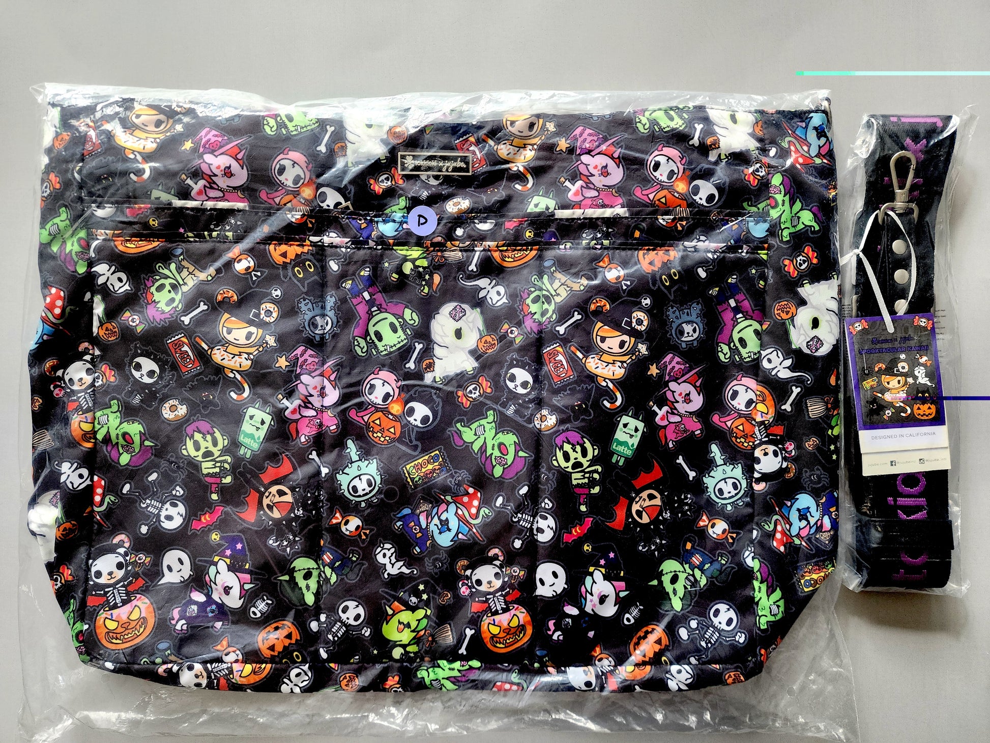 Halloween-themed bag with colorful designs on a gray background