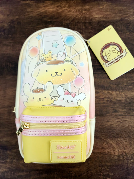 Cartoon-themed pouch with a yellow zipper on a wooden surface