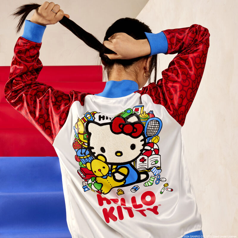hello kitty 50th anniversary satin jacket back view of graphic worn by asian female