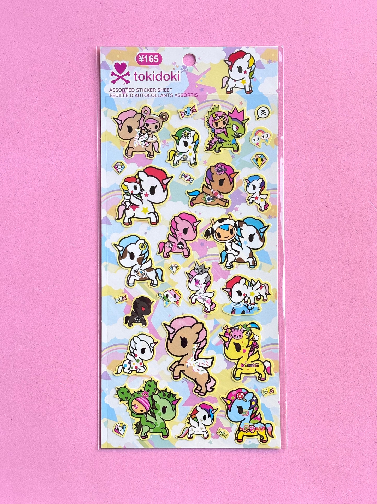 tokidoki sticker sheet with colorful characters on a pink background