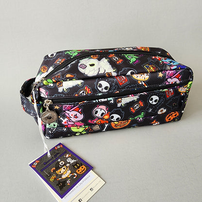 small zippered pouch with Halloween-themed design on a black background