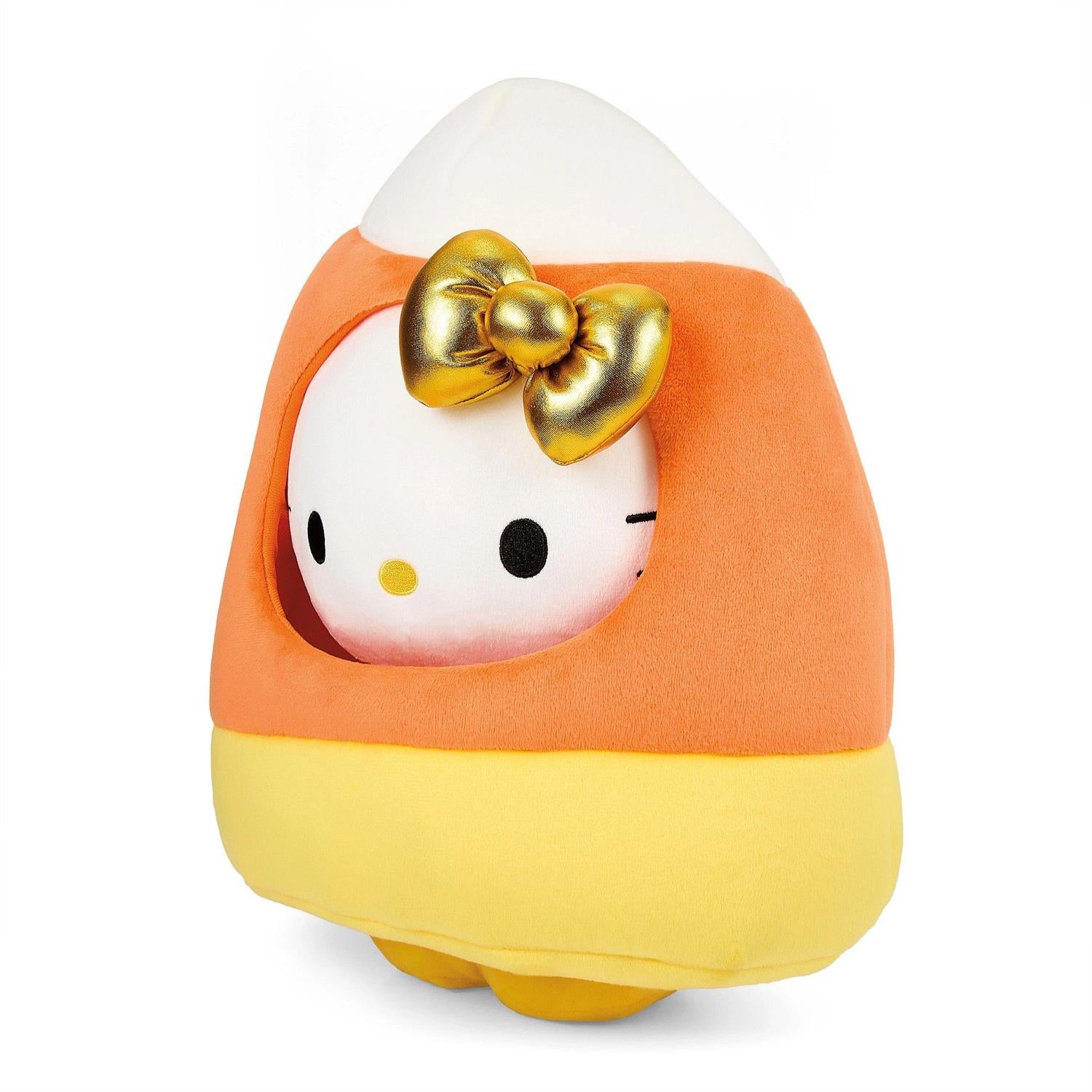 hello kitty dressed as candy corn with gold bow side view