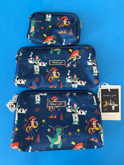 Three blue pouches with cartoon character patterns on a blue background