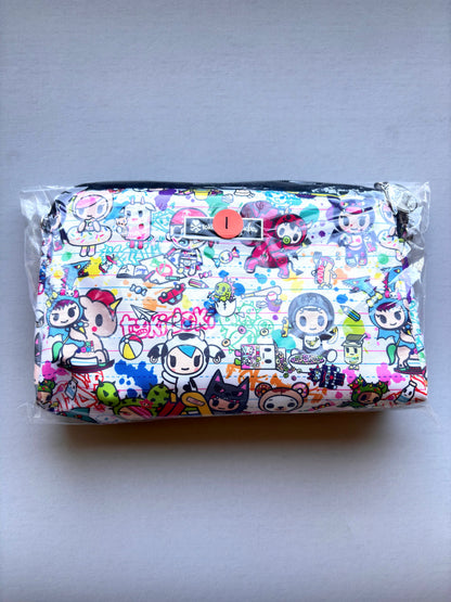 Colorful pouch with cartoon character design in clear packaging on a light gray background