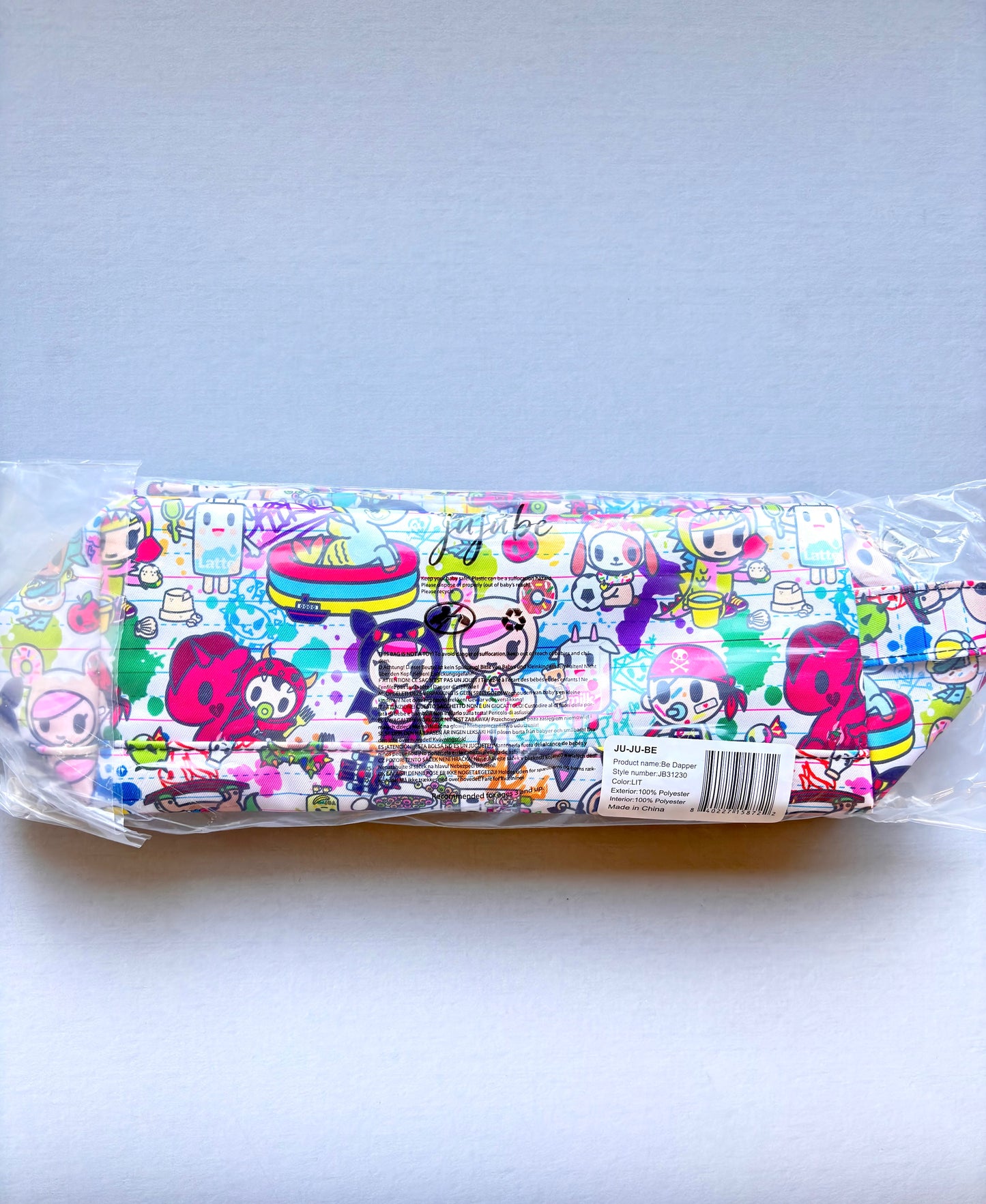 Colorful belt bag with cartoon character design on a white background