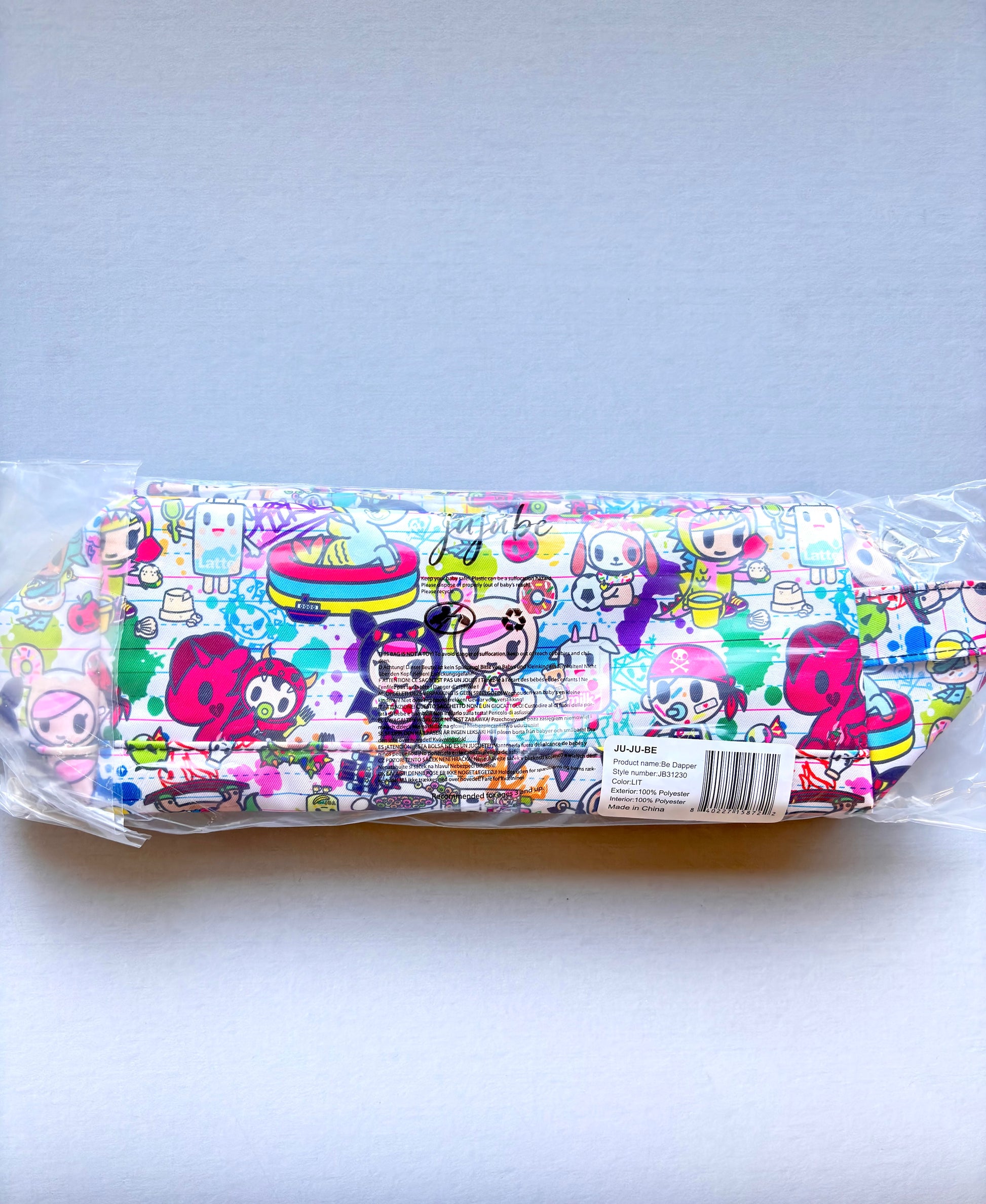 Colorful belt bag with cartoon character design on a white background