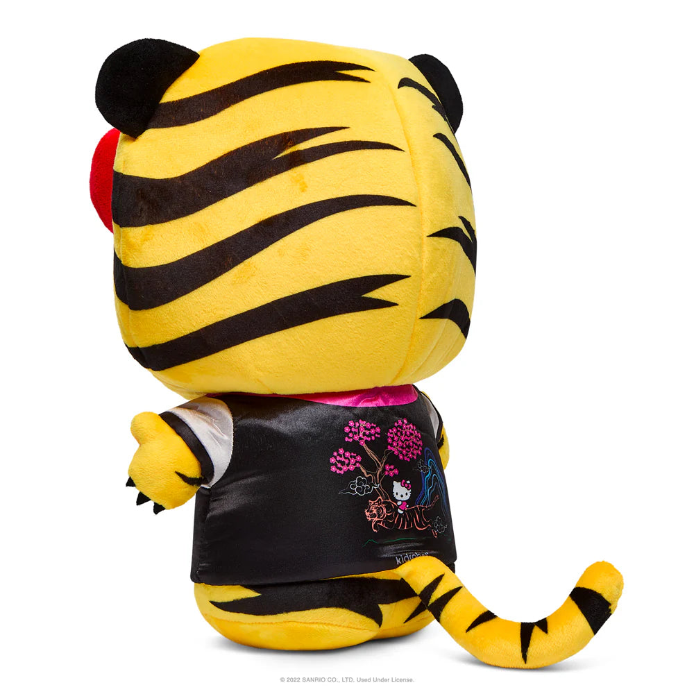 Plush tiger toy with black and yellow stripes, wearing a black outfit with pink floral designs on a white background.