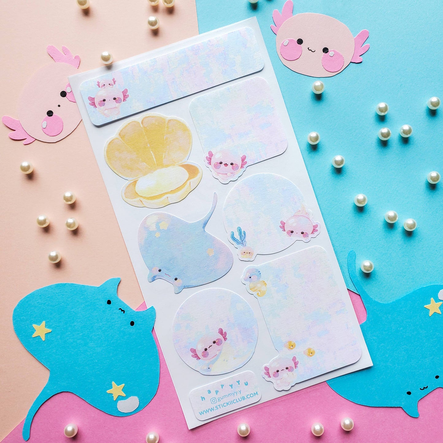 Set of cute axolotl stickers on a colorful background with decorative elements.