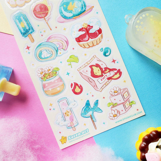 Sheet of colorful snack stickers featuring various cute illustrations on a pink and blue background.