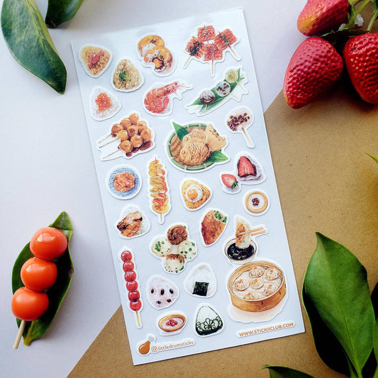 Sheet of Asian food-themed stickers on a white background with strawberries and leaves.