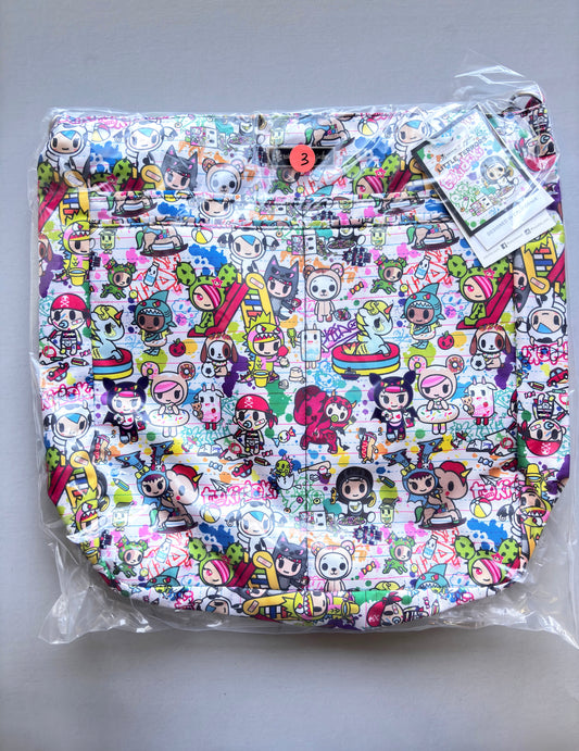 Colorful patterned bag with cartoon characters on a gray background