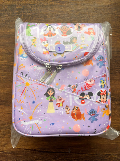 Disney cooler bag
 with character print on a wooden surface