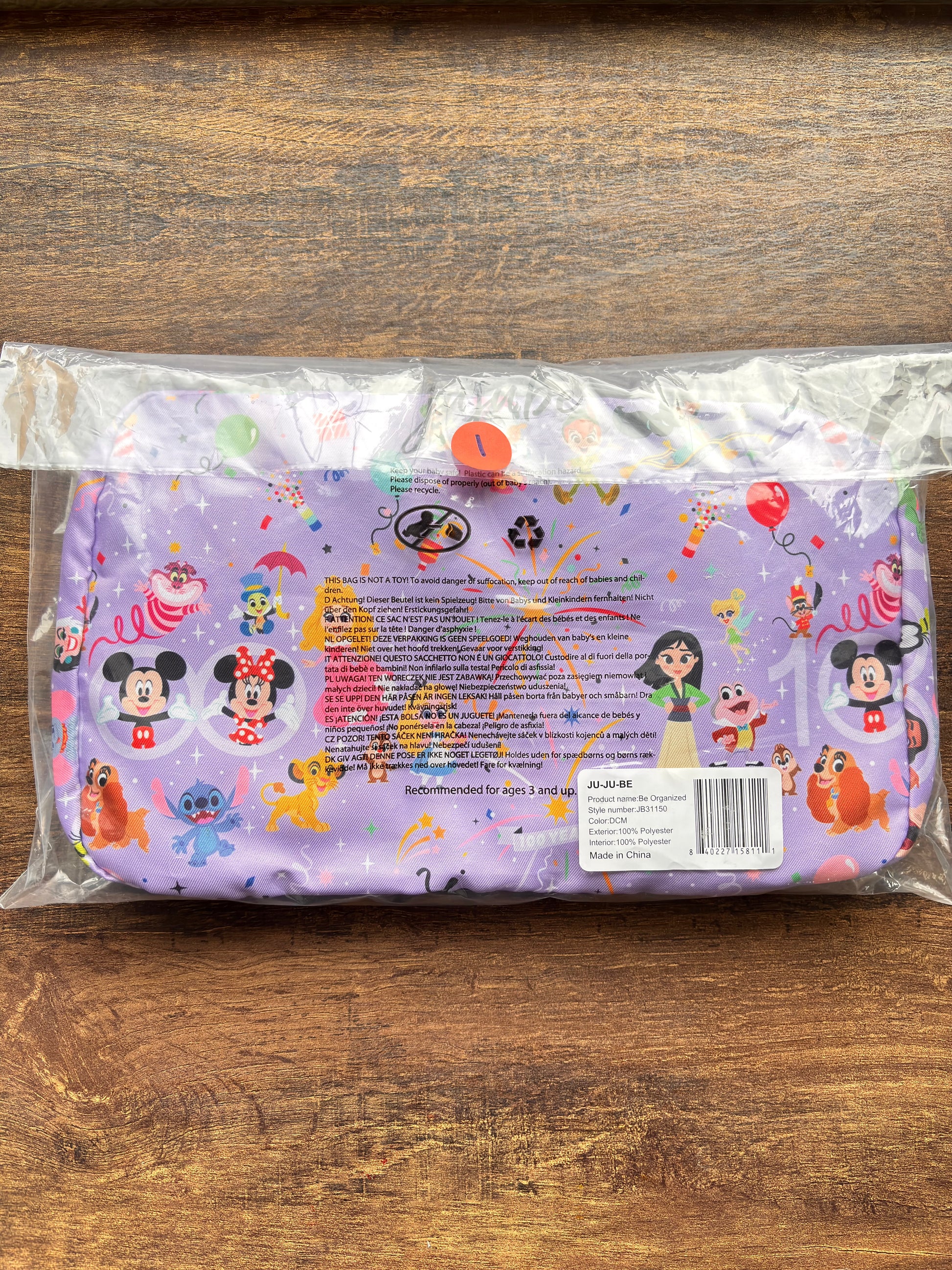 Disney Be Organized organizing cubes with cartoon characters on a wooden surface