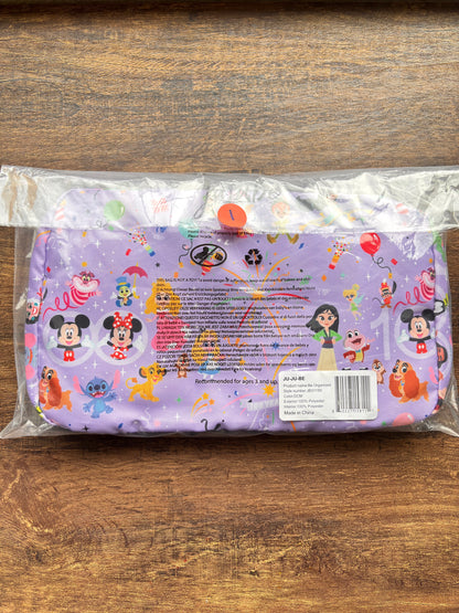 Disney Be Organized organizing cubes with cartoon characters on a wooden surface