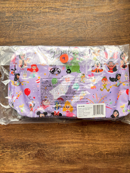 Lavender organizing cubes with Disney cartoon characters on a wooden surface
