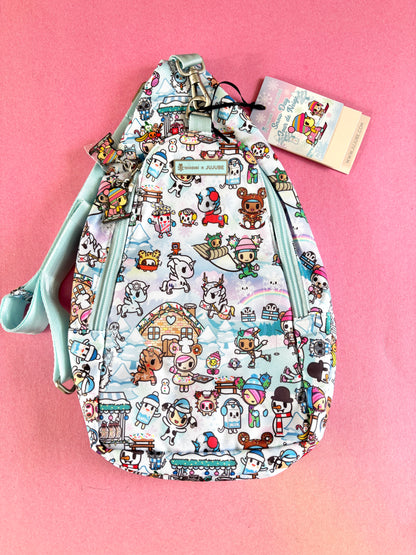 Patterned bag with cartoon characters on a pink background