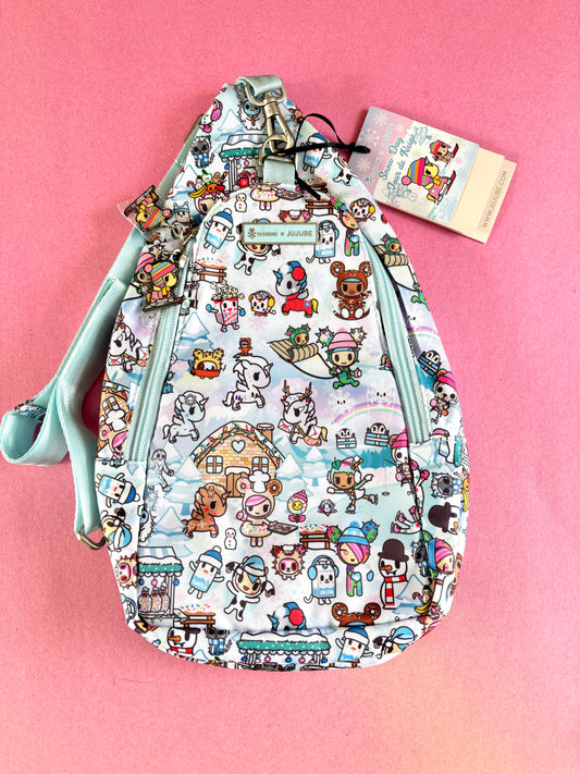 Patterned bag with cartoon characters on a pink background