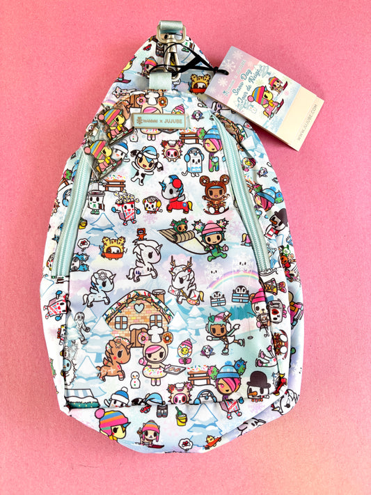 Backpack with cartoon character pattern on a pink background