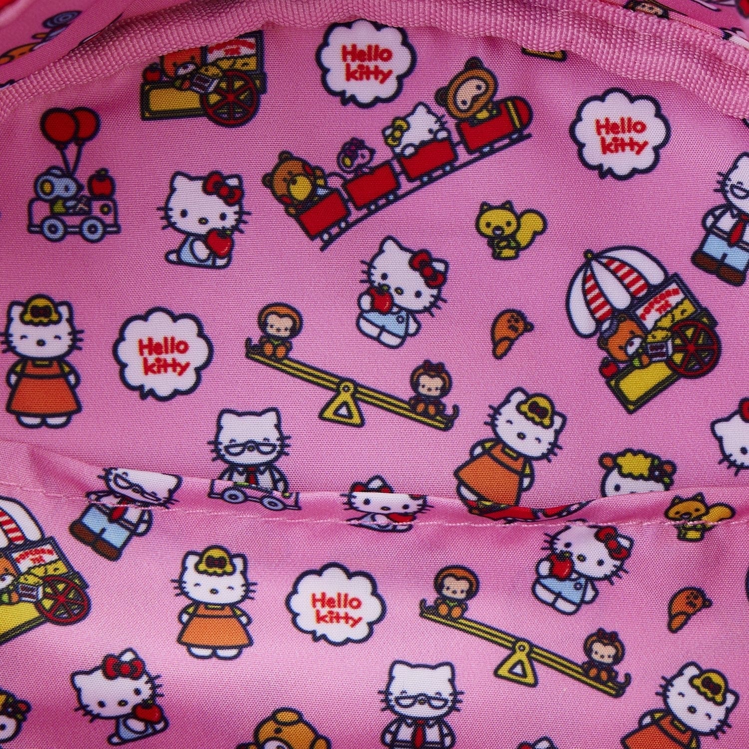 Pink fabric with Hello Kitty and friends pattern