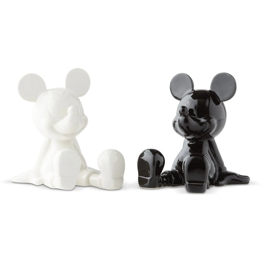 Black and white mouse figurines on a white background