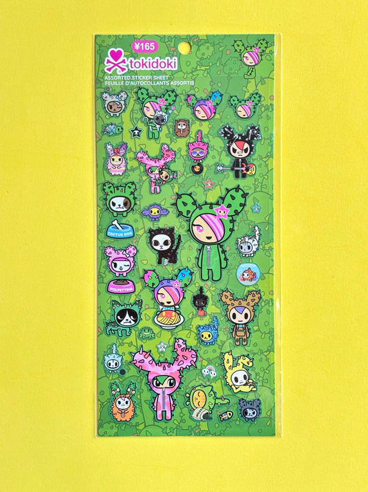 green tokidoki cactus friends stickers on a yellow background