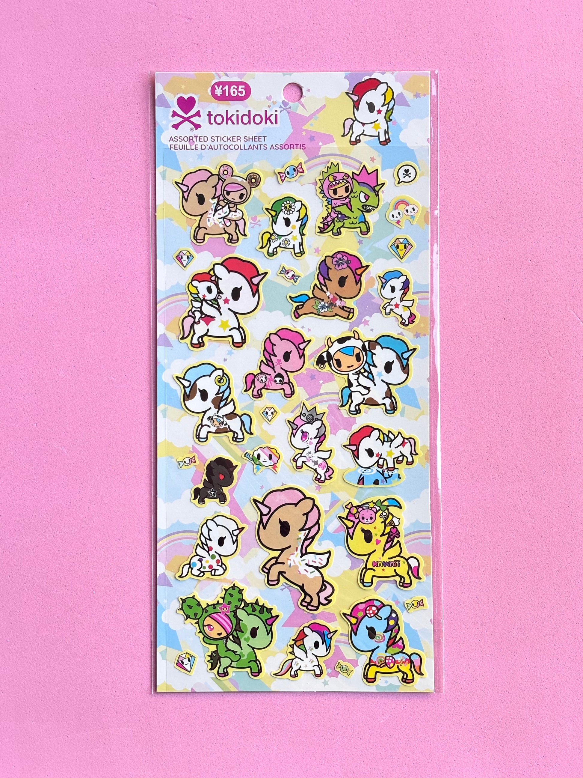 tokidoki sticker sheet with colorful characters on a pink background