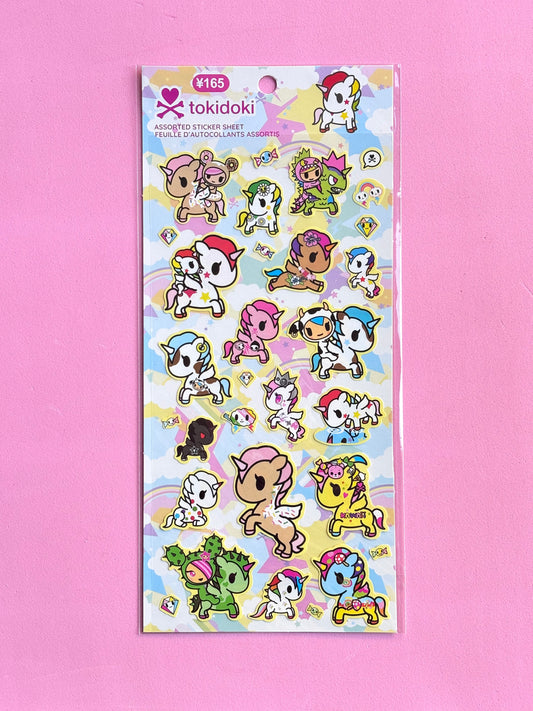 tokidoki sticker sheet with colorful characters on a pink background