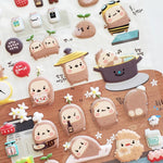 closeup of cute korean stickers suatelier gamja (potato) puffy stickers