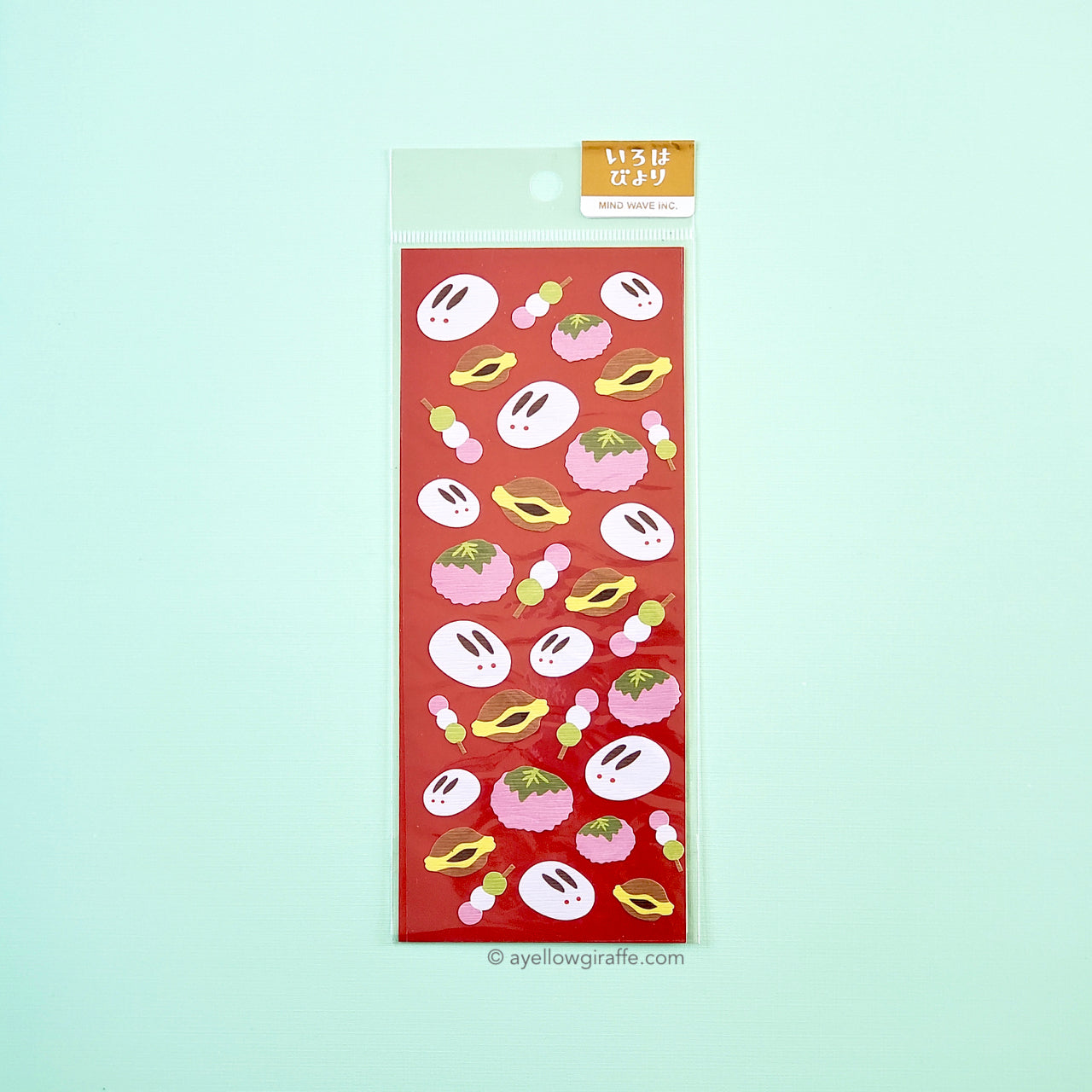 A sheet of decorative stickers with a red background featuring various mochi designs, including rabbit mochi and dango