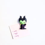 Shopping list hung on magnetic surface with Disney Maleficent 3D Vinyl Figure Magnet