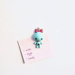 Shopping list hung on magnetic surface with Lilo & Stitch Scrump 3D Vinyl Figure Magnet 