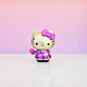 front view of unboxed Metalfigs Hello Kitty in purple dress with microphone