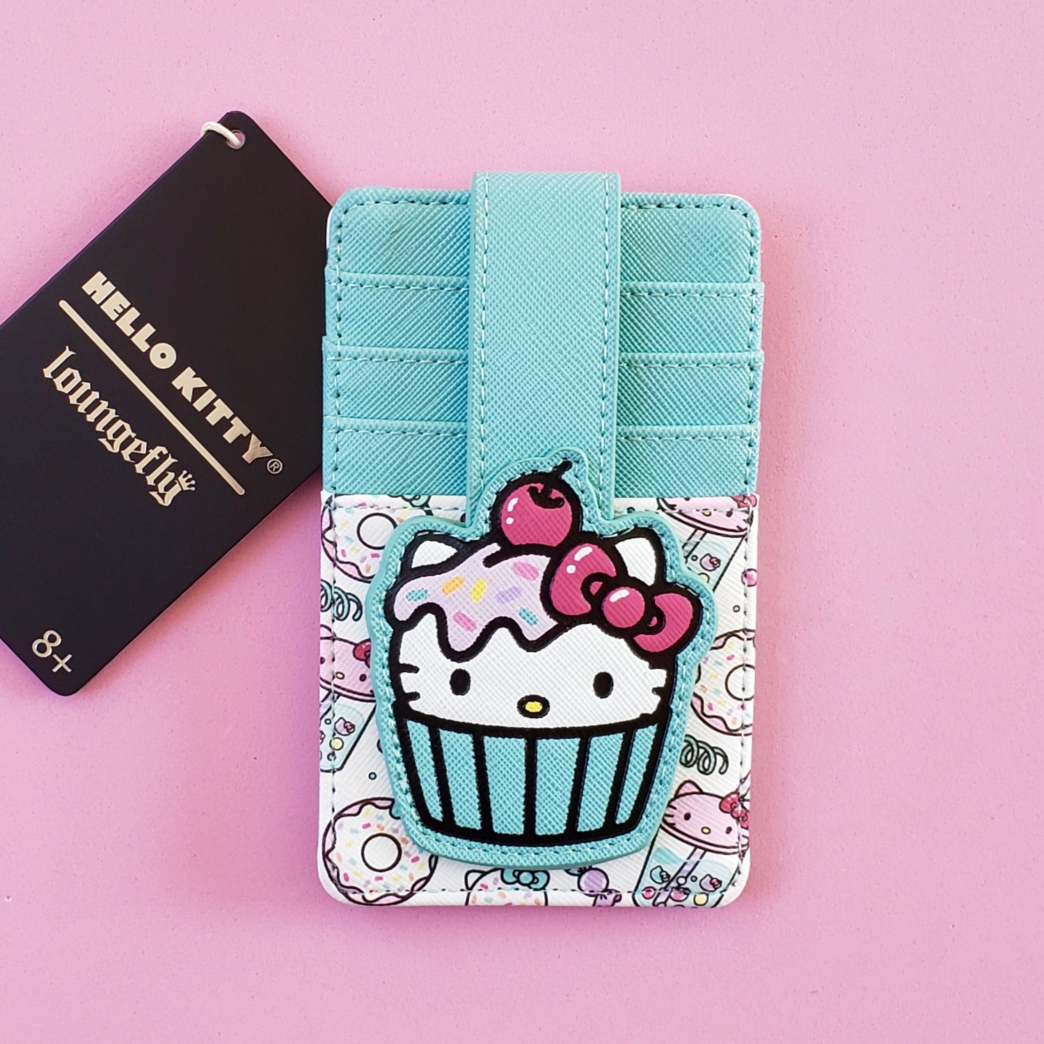 loungefly hello kitty cupcake sweet treats cardholder front view on pink background