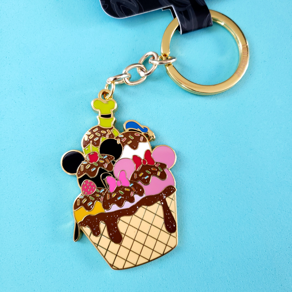 closeup of loungefly disney ice cream sunday keychain with reflective sparkles
