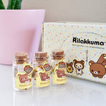 Official San-X Rilakkuma mini erasers in a cute glass jar with cork stopper front view