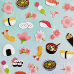 closeup of nekoni sakura & sushi stickers with silver accents