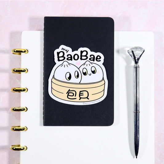 my bao bae dumpling vinyl sticker on notebook desk layout