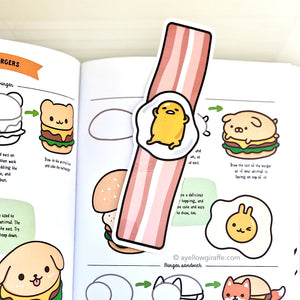 Gudetama fried egg on bacon strip bookmark inside book